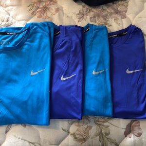 Nike blue and purplish blue shirts size mediums